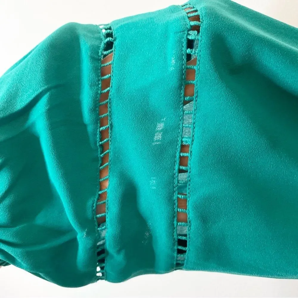 Ann Taylor Loft green jewel toned blouse with cut out detail size S.